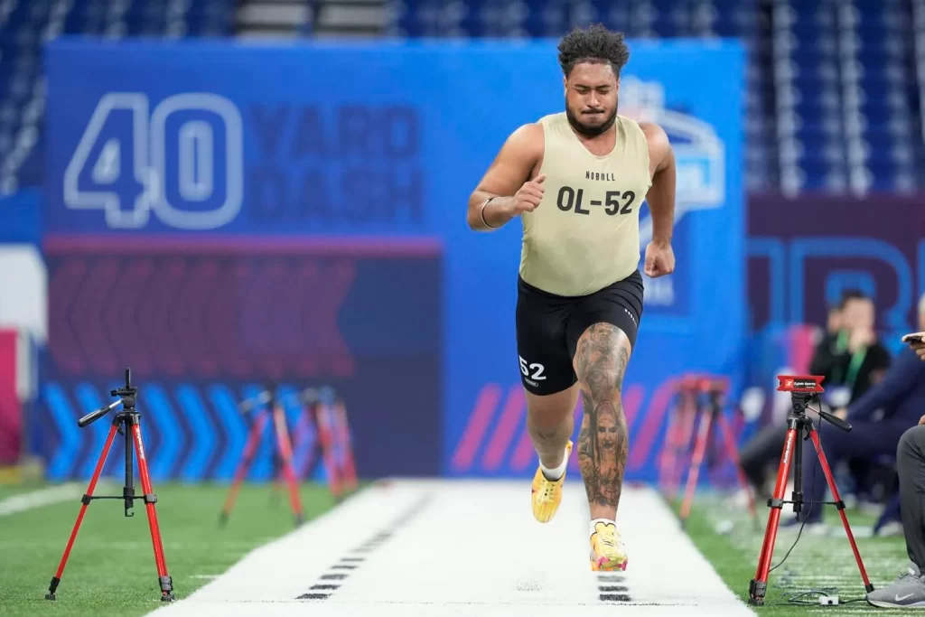 Arizona left tackle Jordan Morgan runs a 5.04 40-yard dash at the 2024 NFL Draft Combine in Indianapolis