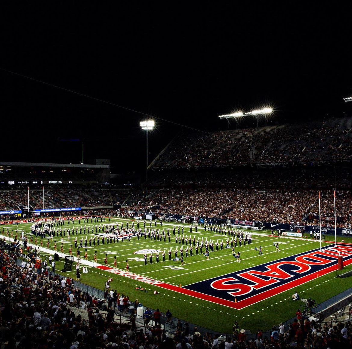 The Pride of Arizona marching band makes a "UA" formation at Arizona Stadium in Tucson, AZ.