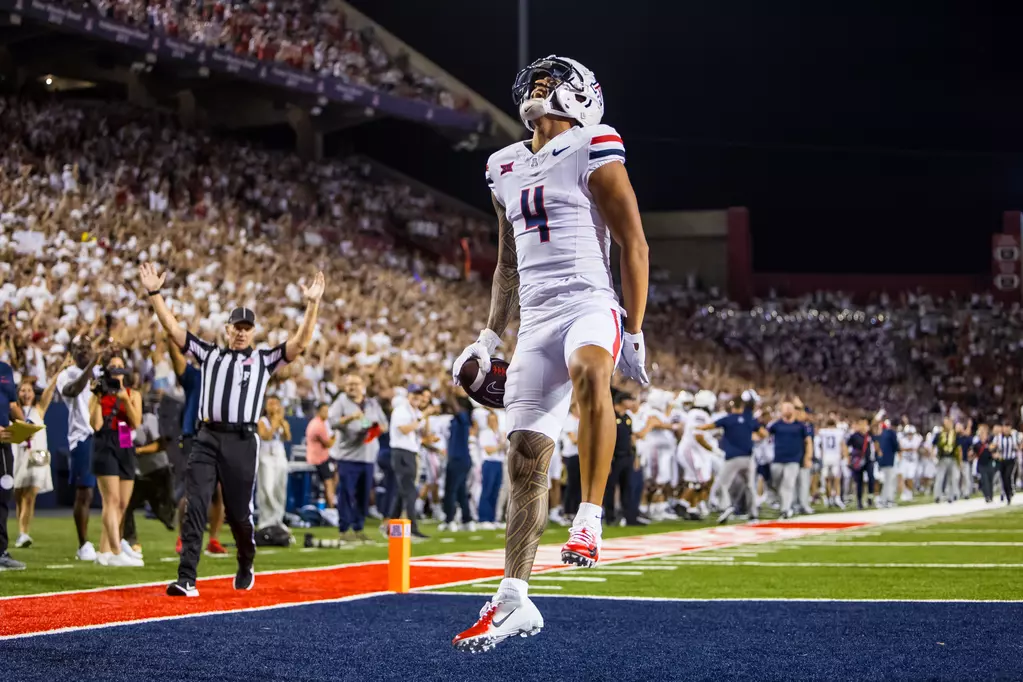 Tetairoa McMillan celebrating one of his four scores against New Mexico, which led to being named Big 12 Offensive Player of the Week.