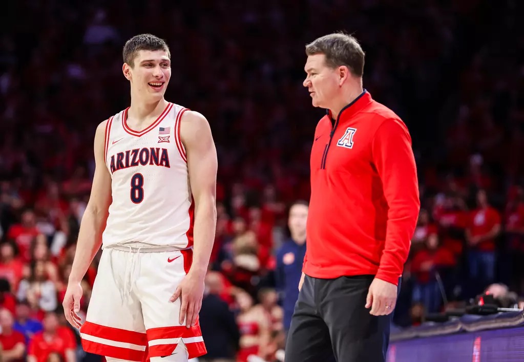 What Arizona head coach Tommy Lloyd and Koa Peat, Jaden Bradley, and Ivan Kharchenkov said postgame following the win over No. 20 Auburn.