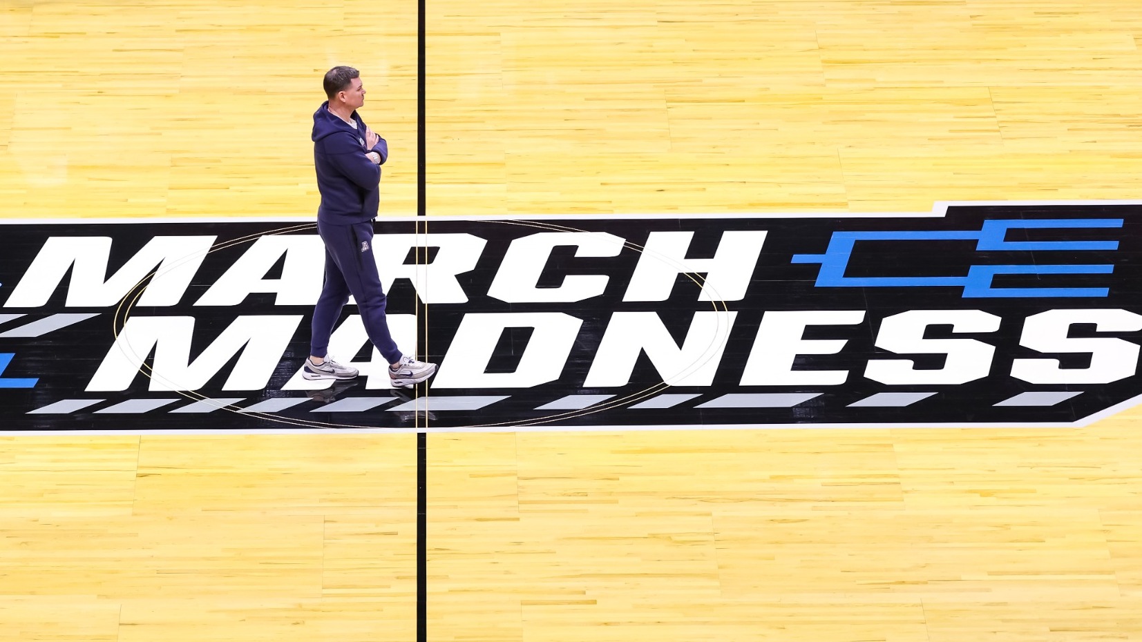 Can the calmness and poise of Arizona head coach Tommy Lloyd and his staff lead the Wildcats on a magical run through March Madness?