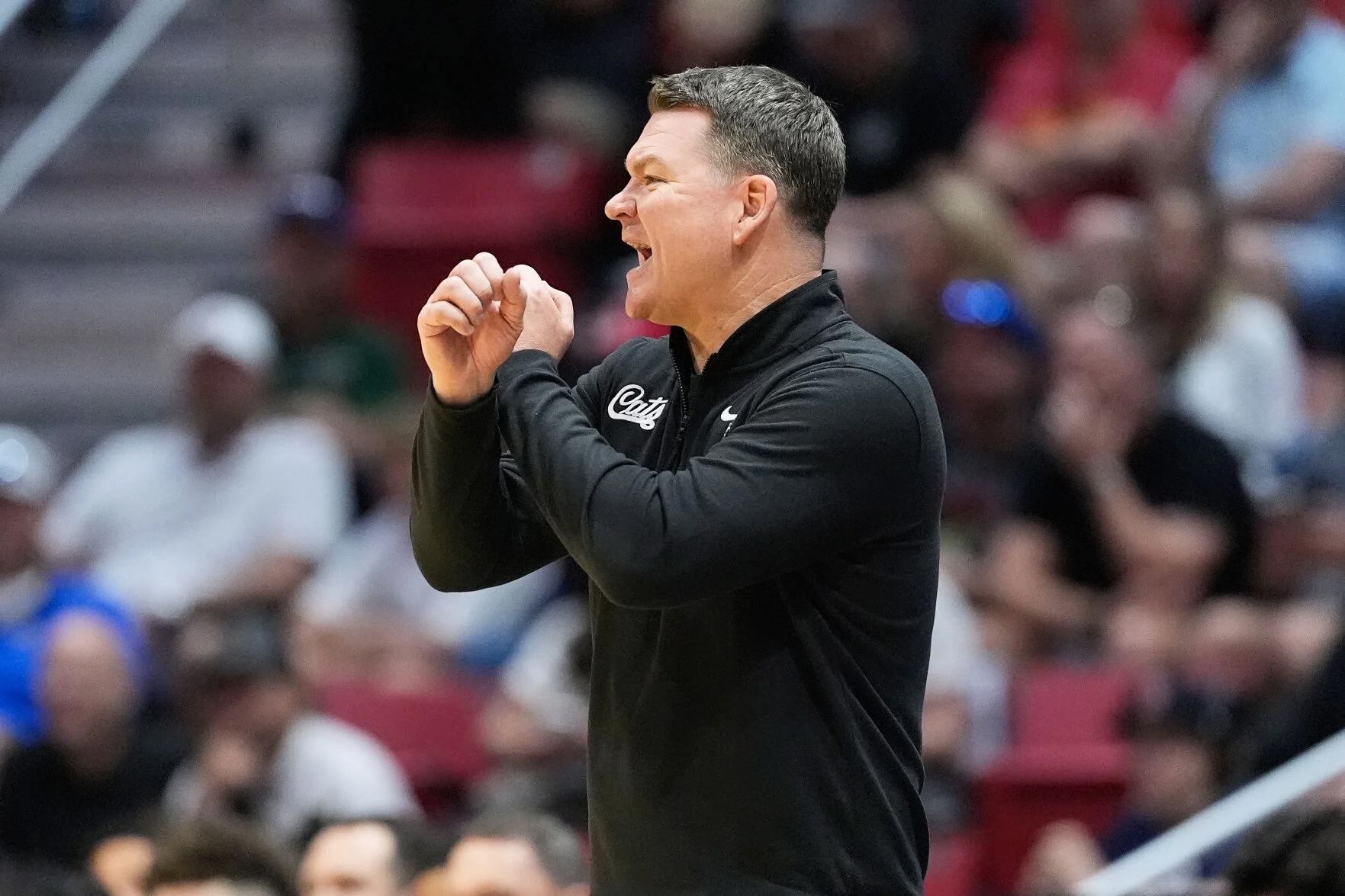 See what Arizona head coach Tommy Lloyd and players Brayden Burries and Koa Peat said after the Wildcats' 92-58 win over Long Island.