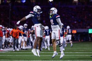 Arizona uses balanced offense and stout defense to roll past NAU in season-opener