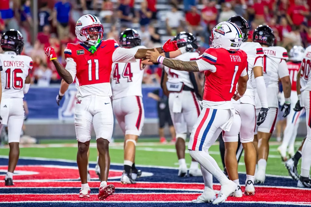 Arizona cruised past Northern Illinois 42-17 as Noah Fifita surpassed Nick Foles to become the program's all-time passing yards leader.